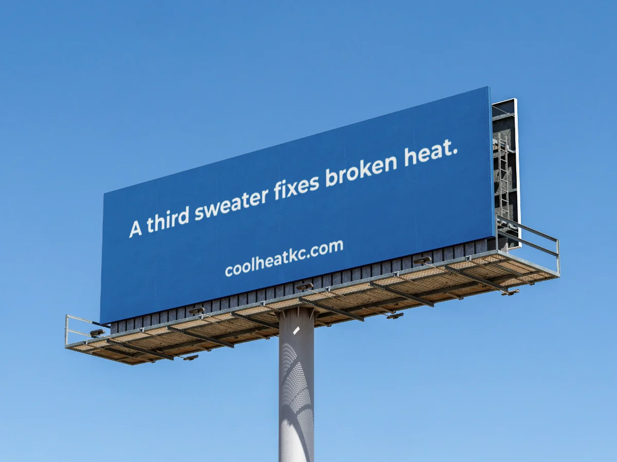Billboard reading "A third sweater fixes broken heat."